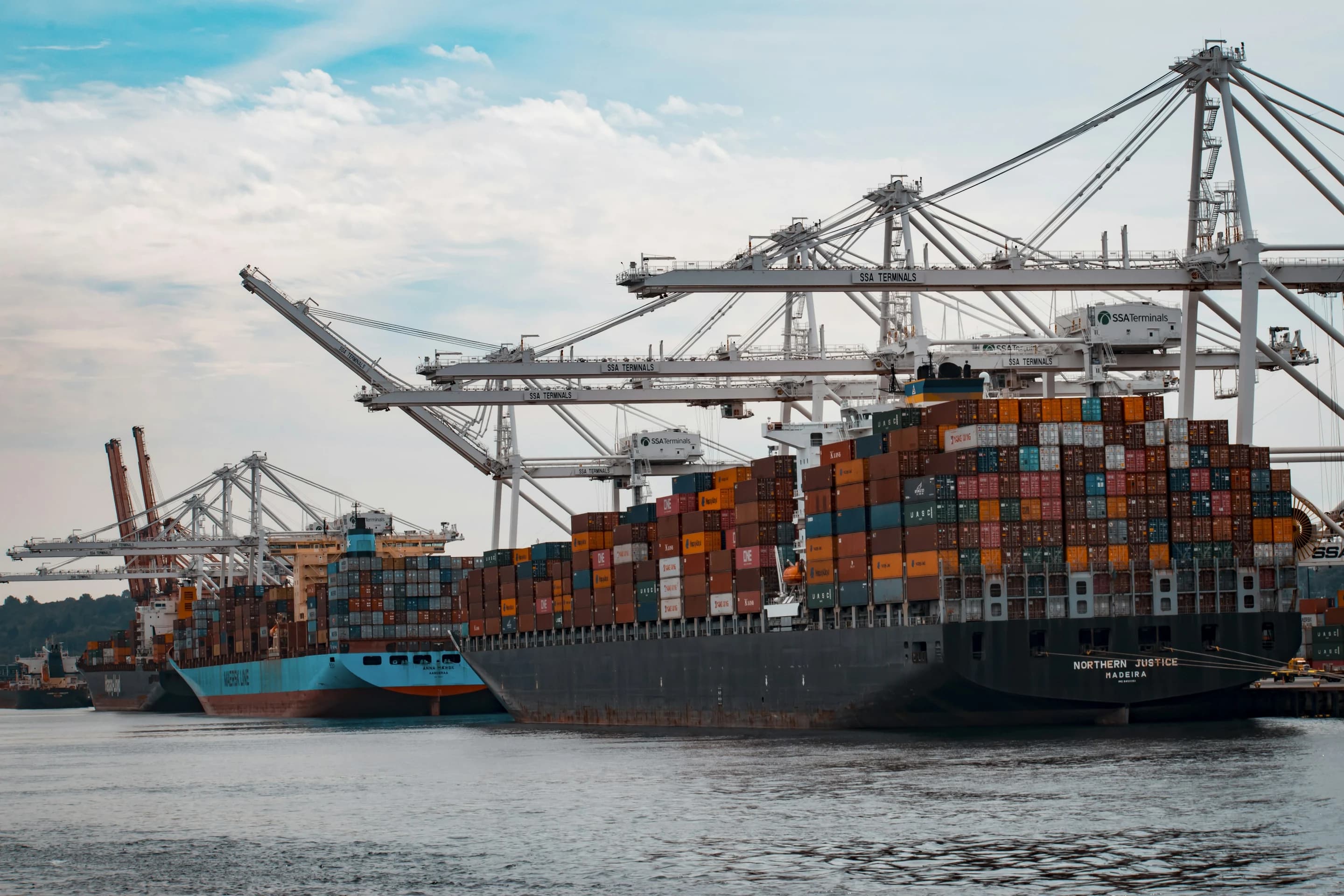 Container vessel loading KhasCom commodity shipments for international export